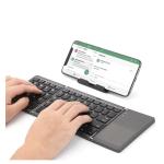 B033 Foldable Bluetooth Keyboard with Integrated Touchpad – 64‑Key Tri‑Fold Portable Design